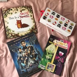 Books and hello kitty container